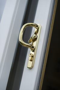white heritage patio door with golden handle