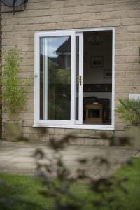Open white uPVC sliding patio door