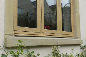 light brown woodgrain foiled flush windows
