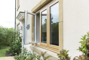 light brown woodgrain foil flush sash windows